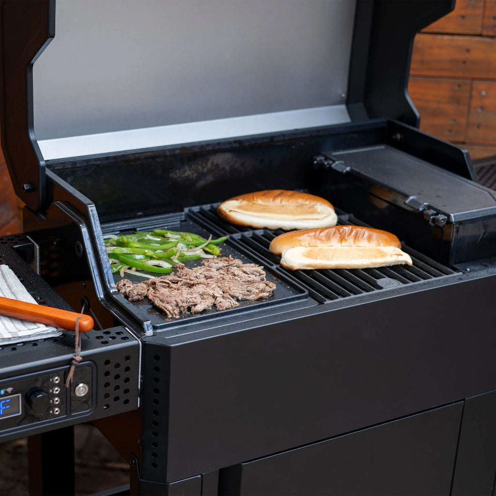 Using the flat-top griddle and a regular cooking grate in an AutoIgnite grill. Each takes up about half the width of the grill.