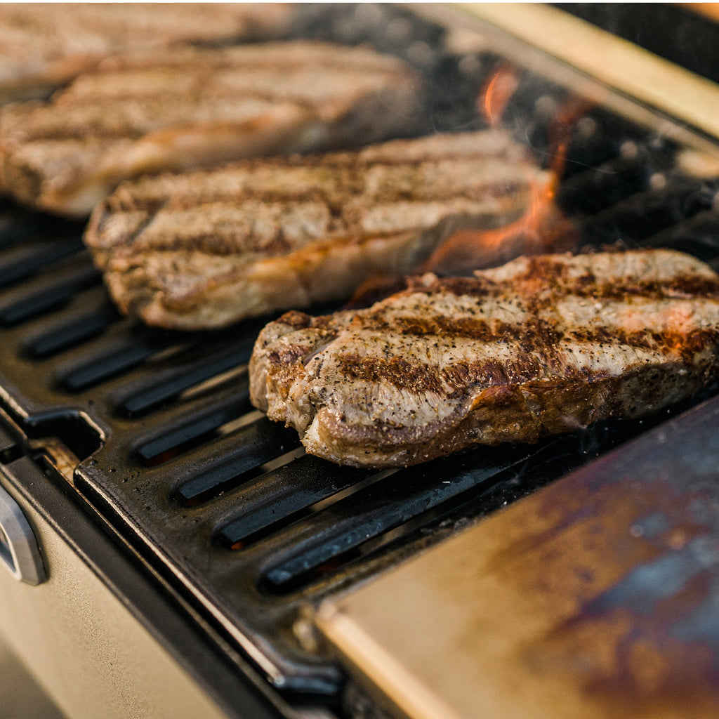 Seared steaks on the grill