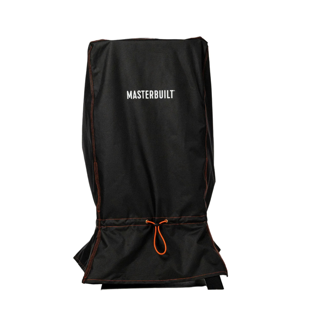 Black cover installed over a vertical smoker with legs. The orange drawstring is pulled tight at the top of the legs. The name MASTERBUILT is printed in white on the cover.