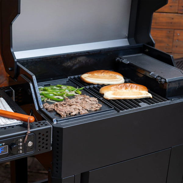 Using the flat-top griddle and a regular cooking grate in an AutoIgnite grill. Each takes up about half the width of the grill. 