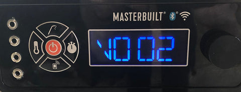 LCD panel displaying version number "V002"