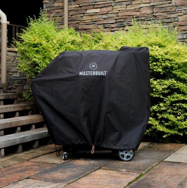 Gravity Series 800 Digital Charcoal Griddle + BBQ + Smoker under cover outdoors on patio