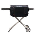 Grill cover on BBQ mounted on cart with shelves