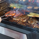 Grill and sear on the lower grate while you grill tender vegetables on the upper grates